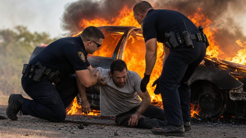 Texas Police Rescue Man From Burning Car